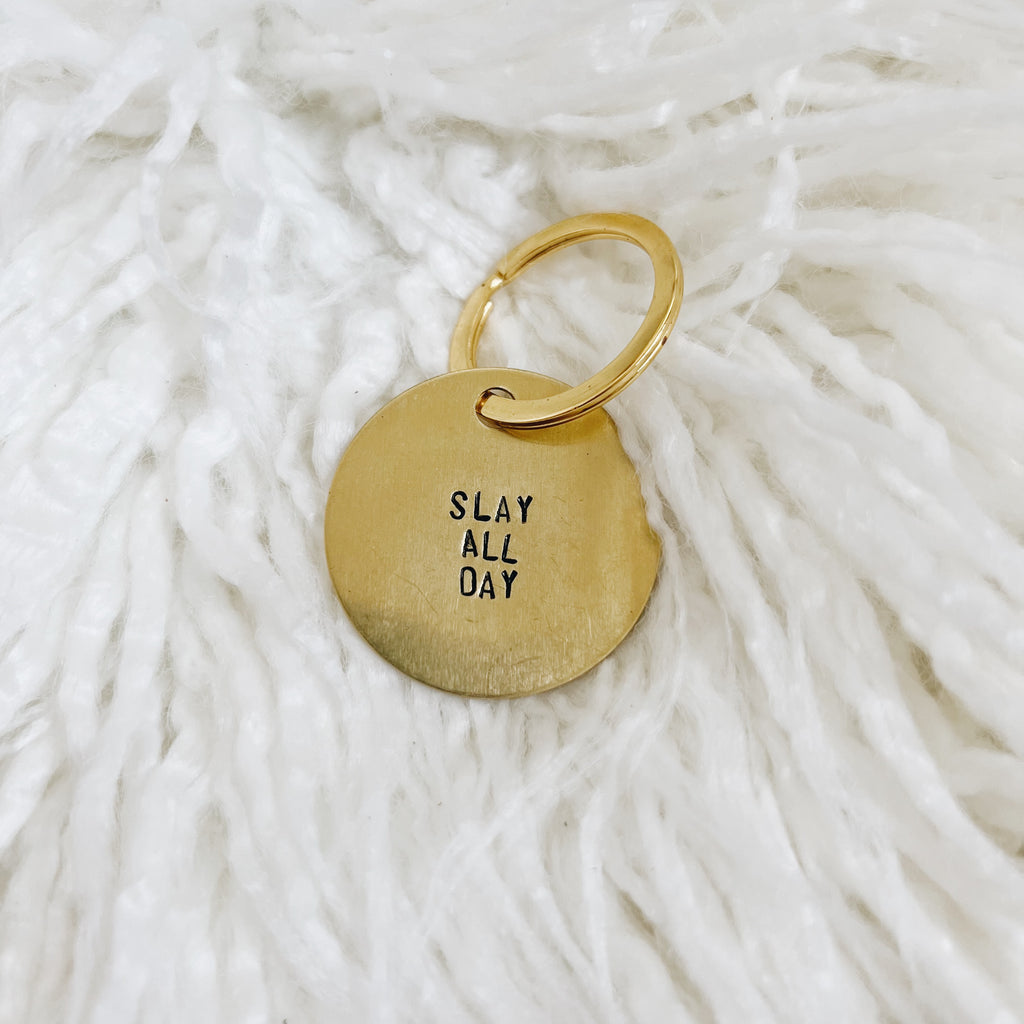 slay all day brass tag