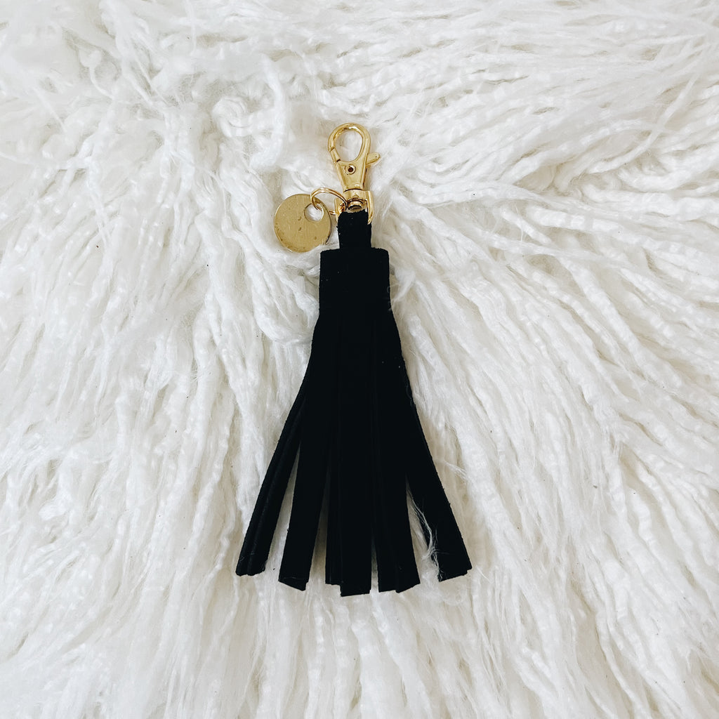 black suede tassel keychain & tiny tag