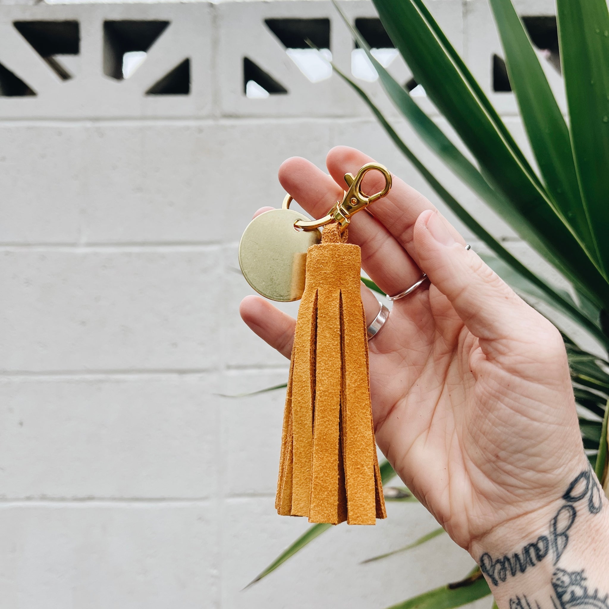 tangerine suede tassel keychain & custom tag