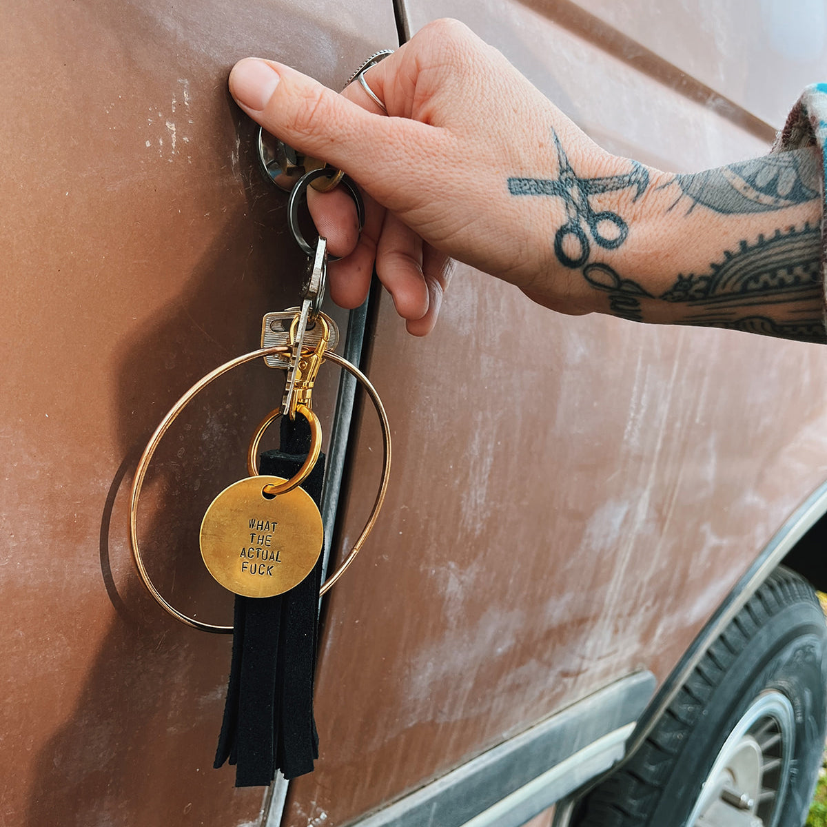 rust suede tassel keychain & custom tag – shop kendra beshk