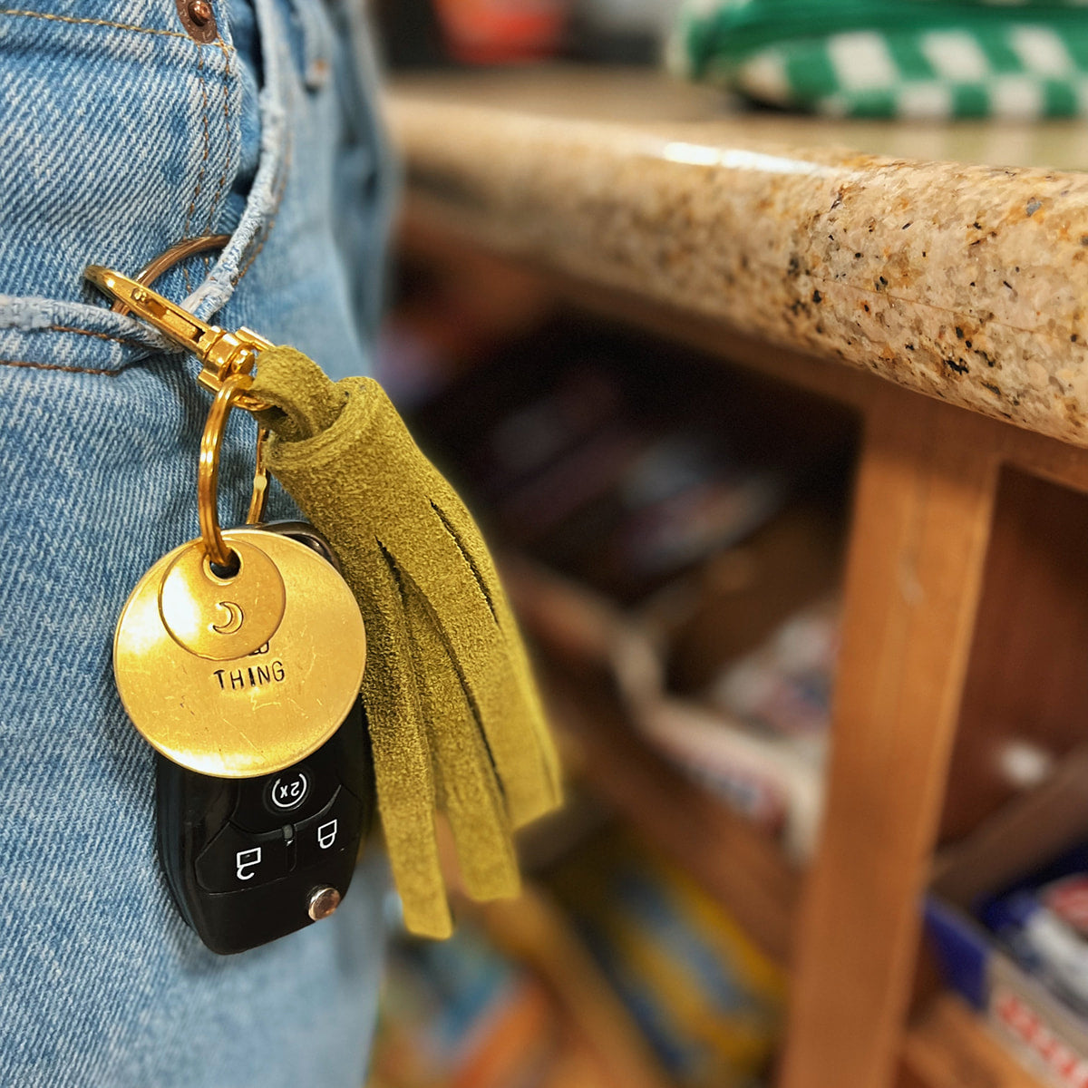 rust suede tassel keychain & custom tag – shop kendra beshk