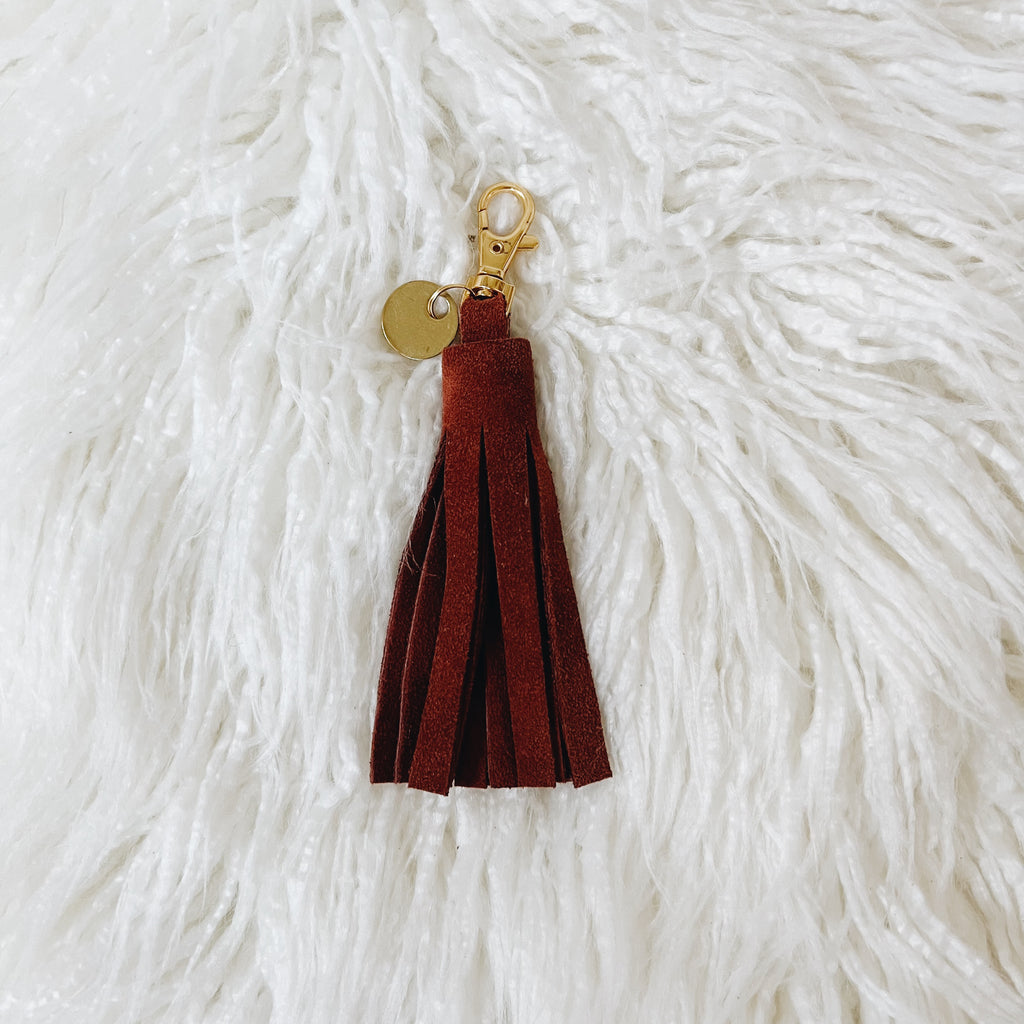 rust suede tassel keychain & tiny tag