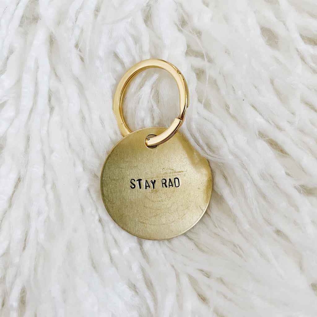 stay rad brass tag