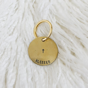 blessed brass tag