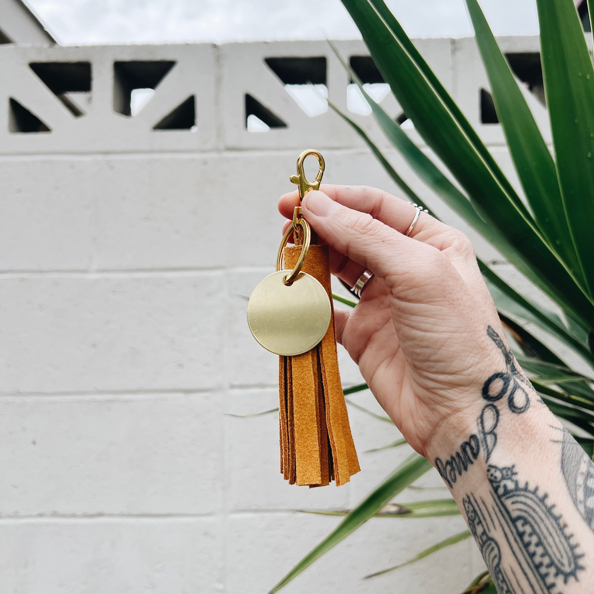 tangerine suede tassel keychain & custom tag