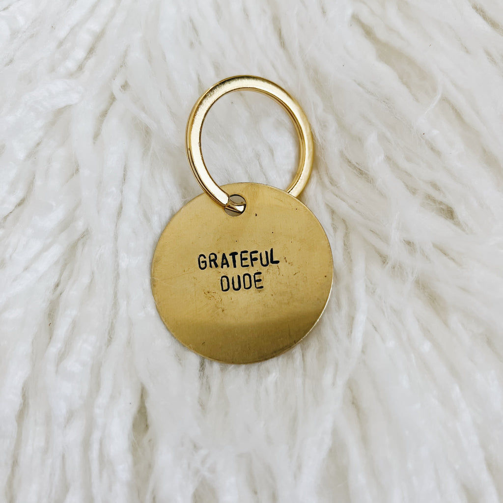 grateful dude brass tag