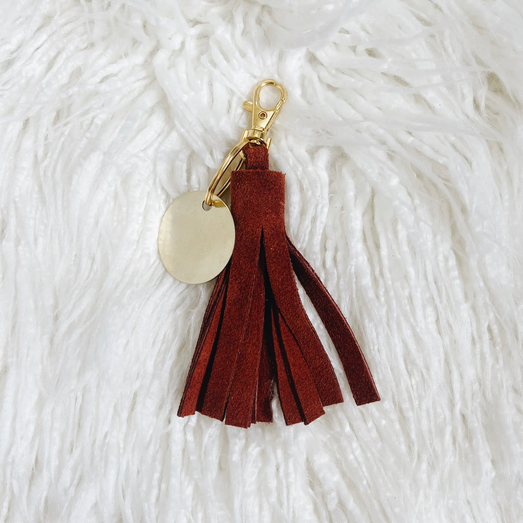 rust suede tassel keychain & custom tag