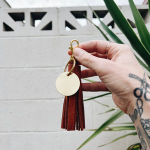 rust suede tassel keychain & custom tag